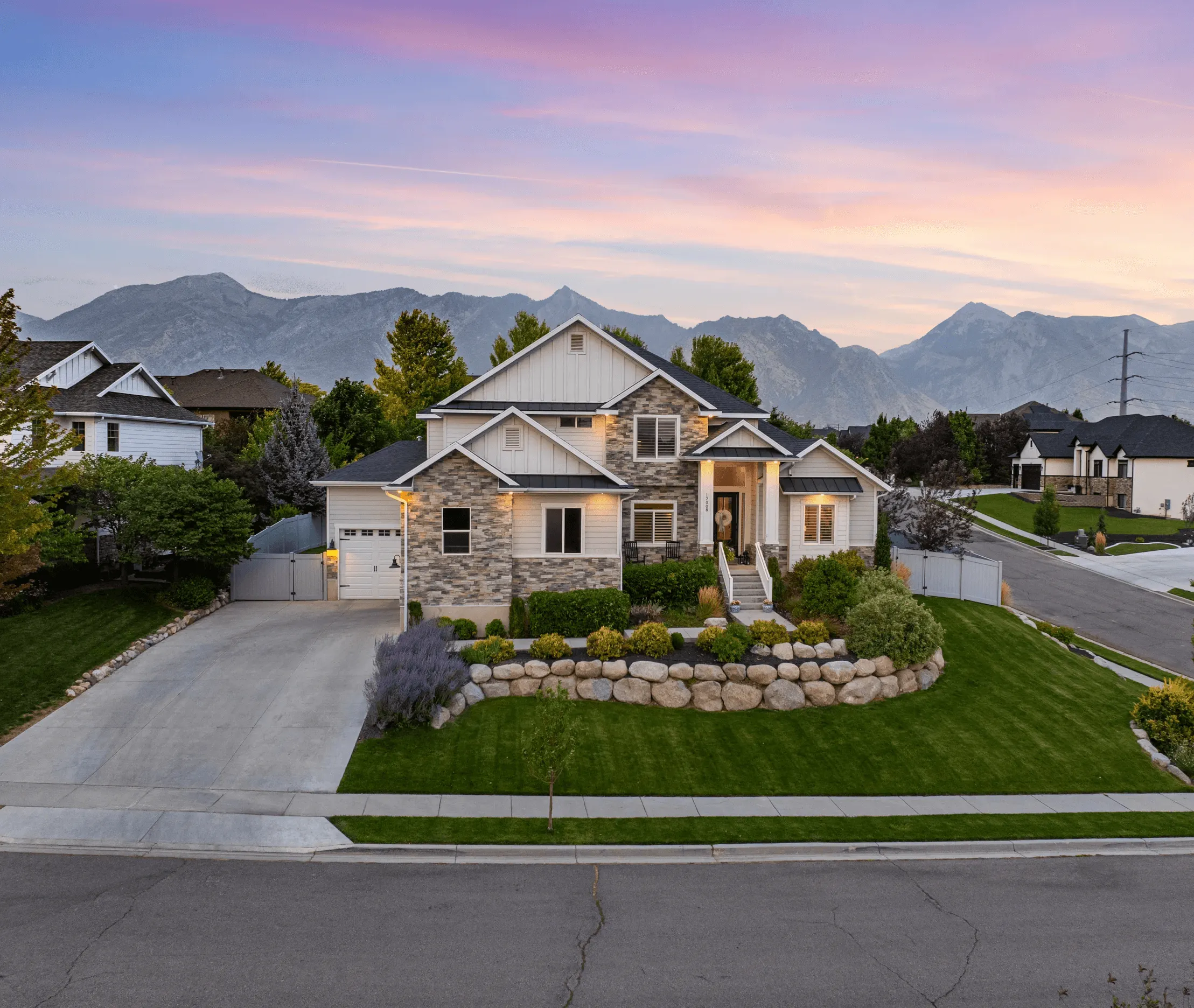 Home exterior with mountain view photographed for a real estate listing in Utah
